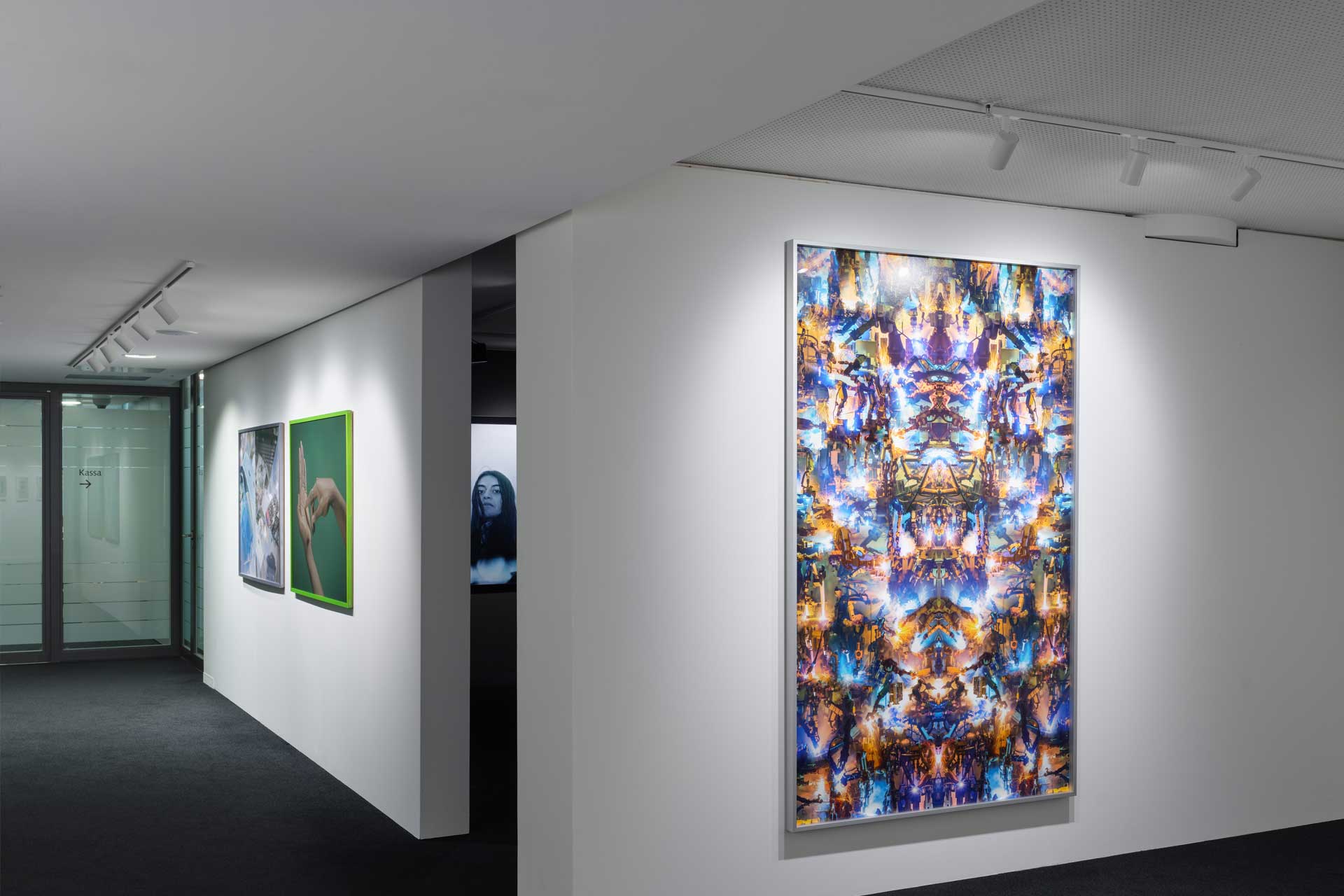 A photo of the Vontobel exhibition in October 2023: Several paintings hanging on a wall